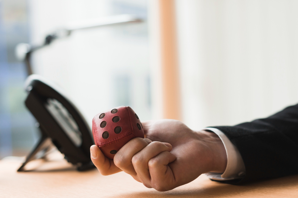 Hand of businessman with dice
