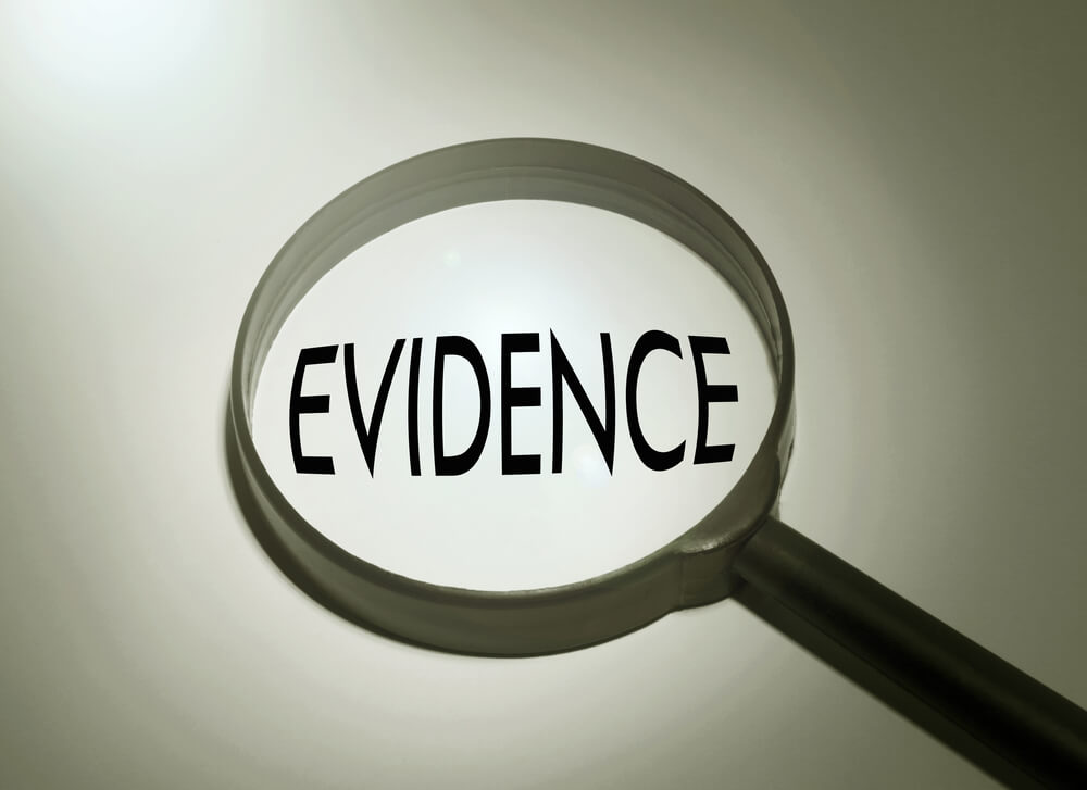 The word evidence under a magnifying glass