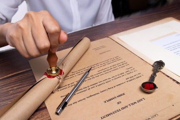 A person signing a Contested Divorce document with a rubber stamp in Texas.