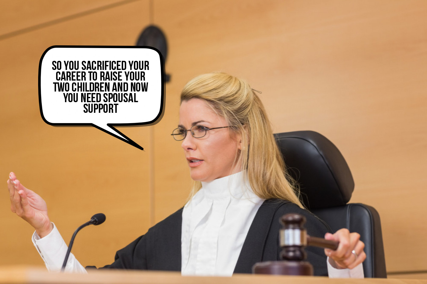 A woman in a courtroom with a speech bubble.