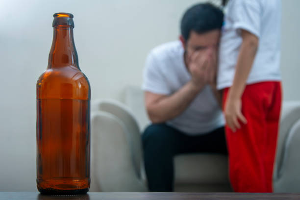 Alcoholic man's little daughter consoles her father when he becomes remorseful