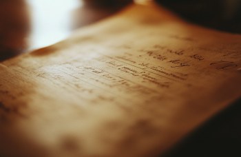 a last will and testament written on a paper read by an executor of the estate