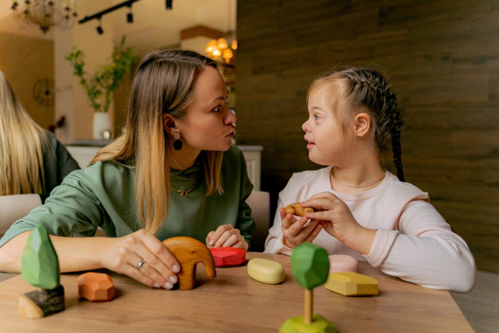 A mother talking to her special needs child