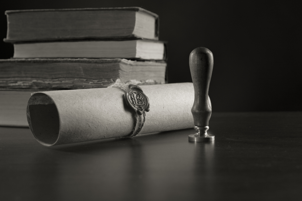 Notary's public pen and stamp on testament and last will. Notary public