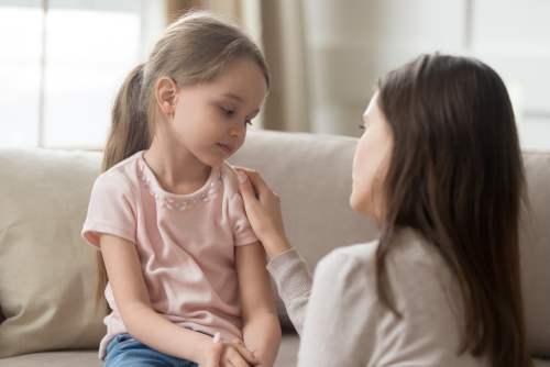 Loving worried mom psychologist consoling counseling talking to upset little child girl showing care give love support, single parent mother comforting sad small sullen kid daughter feeling offended