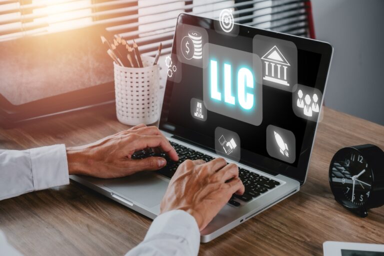 Limited Liability Company (LLC) Business Concept, Person hand using computer and hand touching limited liability company icon on Vr screen.