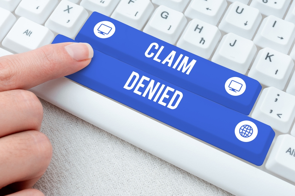 Conceptual caption Claim Denied. Business showcase Requested reimbursement payment for bill has been refused