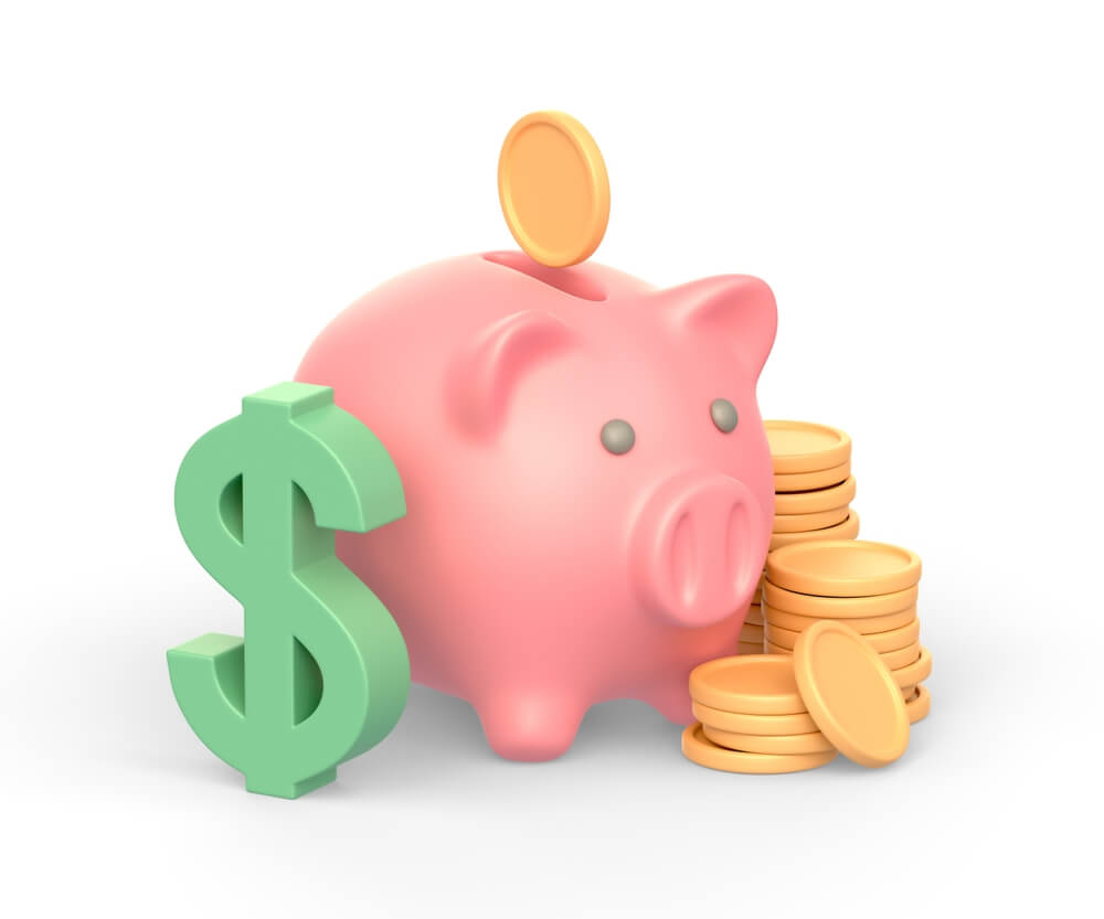 A pink piggy bank with a stack of coins on the right of the piggy bank and a green dollar sign on the left of the piggy bank and one gold coin is going into the piggy bank 