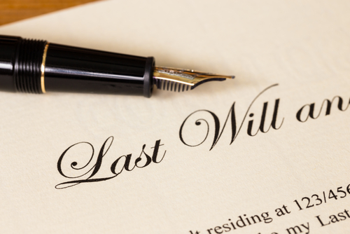 Last will and testament with pen concept for legal document in article titled, why college students need a basic last will
