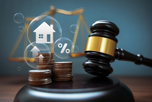 Judge Auctions and the Real Estate Legal System House model and hammer with icons on wooden table Laws governing foreclosures and bankruptcies, debts, or encumbrances. how is an llc treated in a divorce in texas