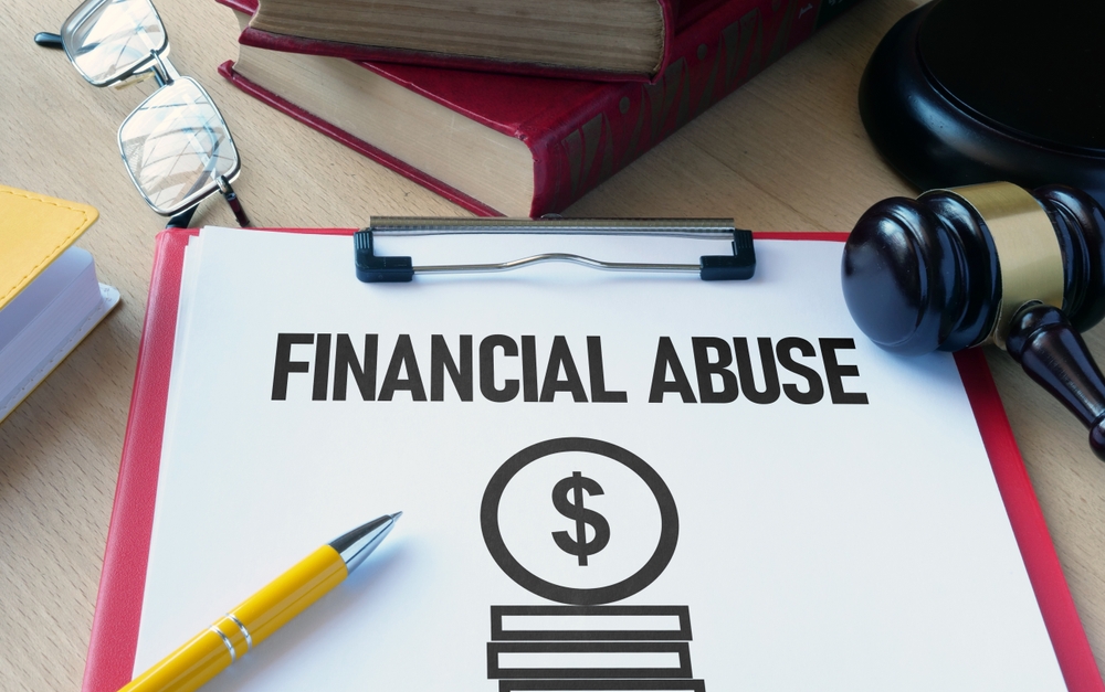 Financial abuse is shown using a text