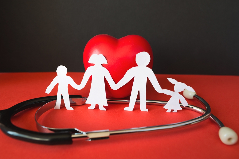 Family paper cut with red heart and stethoscope, heart health, family health insurance concept, Red Cross CPR, World Heart Day, World Health Day, life insurance