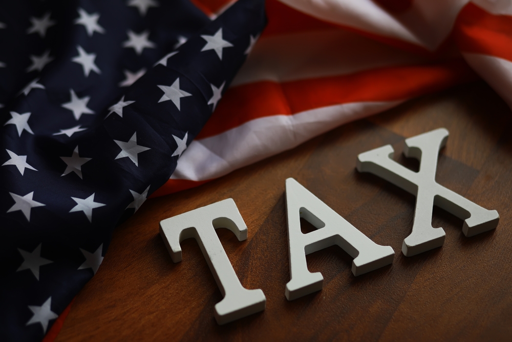 Tax Concept with American Flag: Financial Obligations and National Pride in the USA