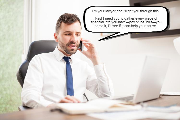 A professional man in a white shirt and tie speaking on the phone at a desk with a laptop appearing engaged in a serious conversation.