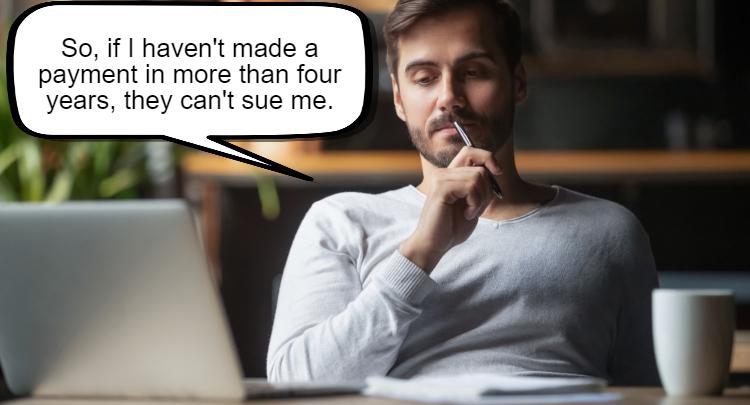 A man sitting at a desk, holding a pen, thinks, "So, if I haven't made a payment in more than four years, when will they sue me?

