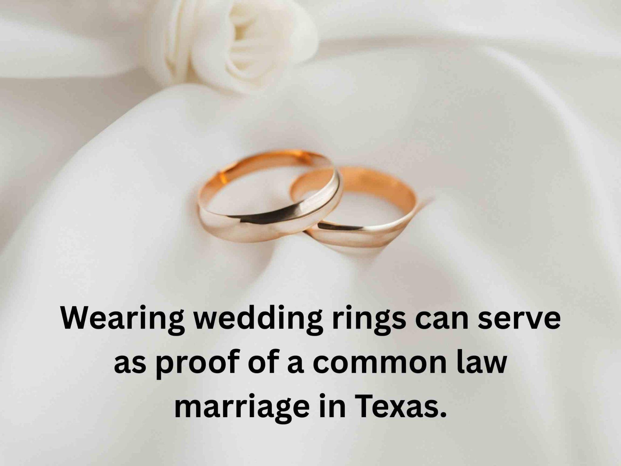 Two gold wedding rings rest on a white fabric surface, with a text overlay explaining how do you prove a common law marriage in Texas using wedding rings as symbolic evidence.